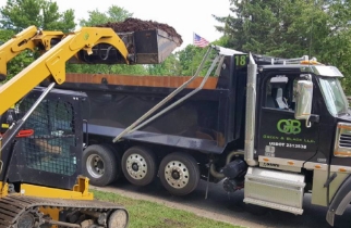 Green & Black dump truck